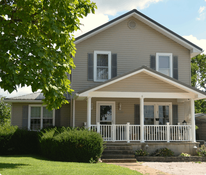 A beige 2-story house