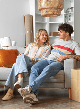 a couple sitting on the couch