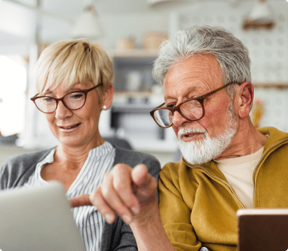 couple viewing laptop