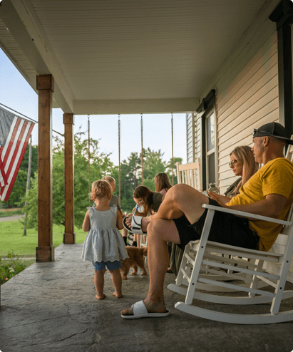 family hanging out on porch